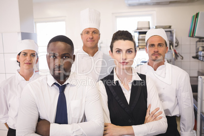 Restaurant manager with his kitchen staff