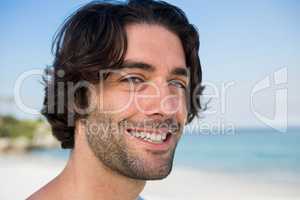Close up portrait of smiling confident man