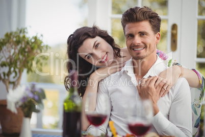 Portrait of romantic couple embracing each other