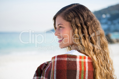 Close up of happy thoughtful woman at beach