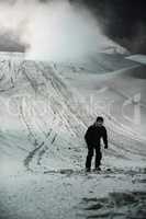 Skier skiing in snowy alps