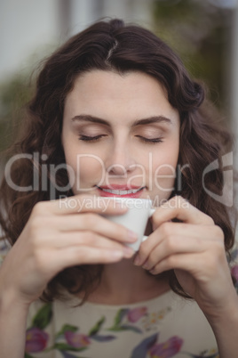 Beautiful woman having coffee