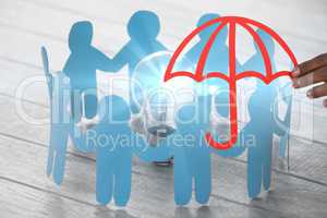 Composite image of hand holding a red umbrella