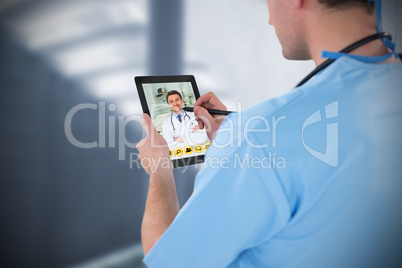 Composite image of surgeon using digital tablet