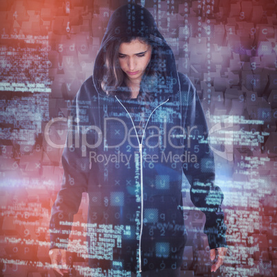 Composite image of young female hacker in black hoodie standing