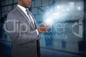 Composite image of businessman using smart phone