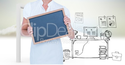 Midsection of businesswoman holding blank slate against graphics