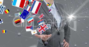 Midsection of businesswoman with various flags