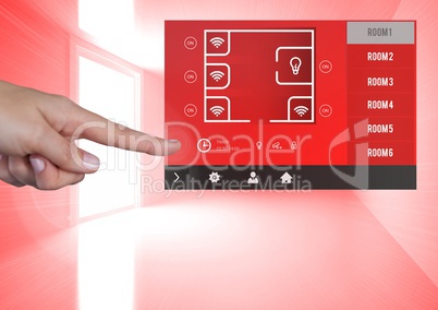 Hand touching a Home automation system App Interface