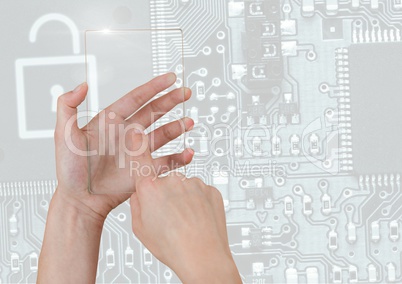 Hand holding glass screen over security circuit board interface