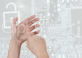 Hand holding glass screen over security circuit board interface