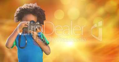 Child photographing over blur background