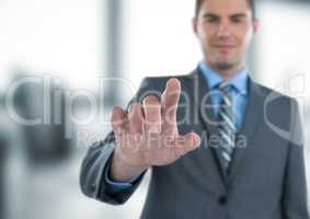 Businessman touching futuristic screen