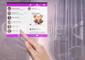 Hand touching Social Media App Interface in city