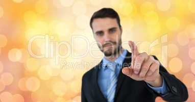 Confident businessman touching screen