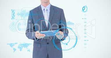 Midsection of businessman holding digital tablet surrounded with icons