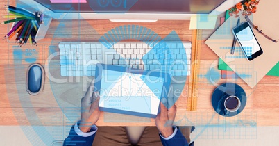 Digitally generated image of businessman holding tablet PC