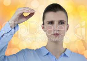 Businesswoman gesturing over bokeh