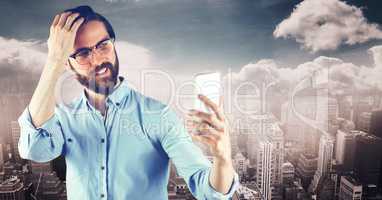 Hipster taking selfie though smart phone against city