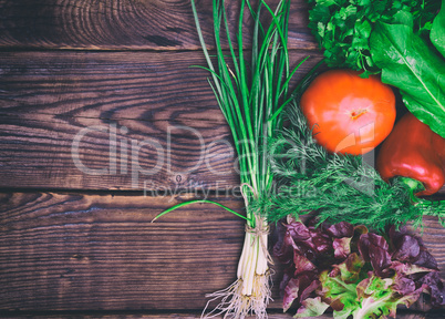 Fresh ripe vegetables on a wooden surface