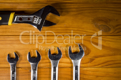 Adjustable wrench and wrenches