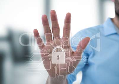 Hand with white lock graphic in blurry grey office
