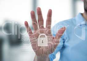 Hand with white lock graphic in blurry grey office