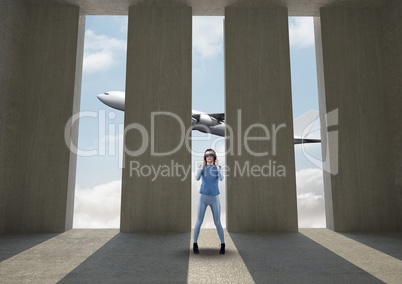 Woman wearing VR glasses at doorways while airplane flying outside