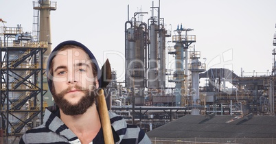 Hipster with ax against industry