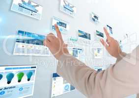 panels with websites(blue) in light background. woman hands doing something on it