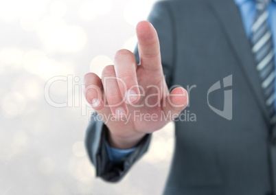 Midsection of businessman touching screen