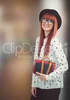 Happy female hipster holding diaries