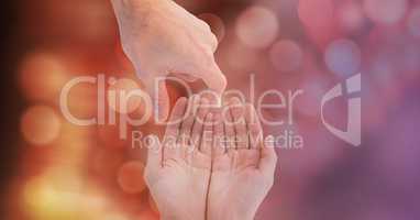 Close-up of hands over blur background