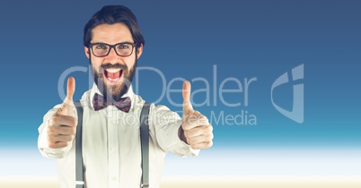 Hipster showing thumbs up against sky