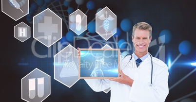 Digital composite image of doctor showing x-ray on screen over futuristic screen