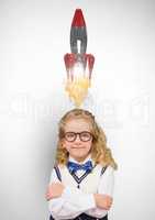 Little girl wearing eyeglasses with rocket over head