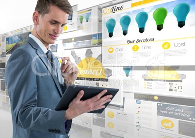 panels with websites(yellow), business man with tablet