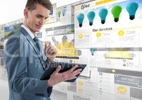 panels with websites(yellow), business man with tablet