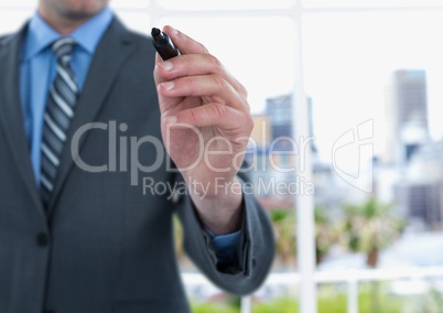 Midsection of businessman writing on screen