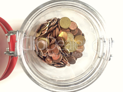 euro coins in a glass jar