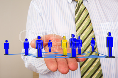 Businessman holding network