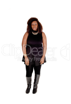 African woman standing business attire.