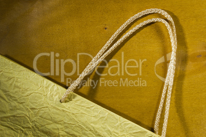 Rope handles from a paper bag