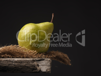 Organic pear on a wooden table