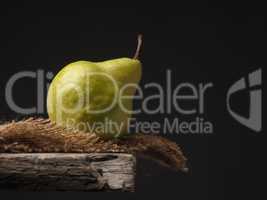 Organic pear on a wooden table