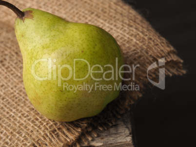 Organic pear on a wooden table