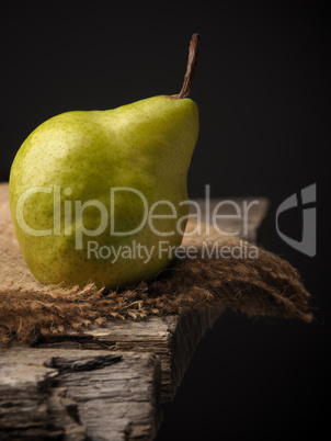 Organic pear on a wooden table