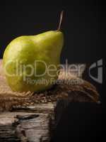 Organic pear on a wooden table