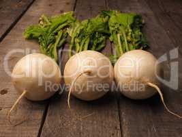 Three may turnip on wood