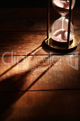 Hourglass On Wood